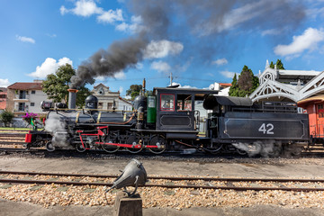 Train at the station waiting for passengers - former steam locomotive in Minas Gerais, train ride between the cities of Tiradentes and Sao Joao del Rei