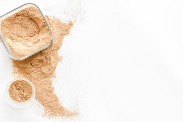 Nutrition for workout with protein cocktail powder on white background top view mockup