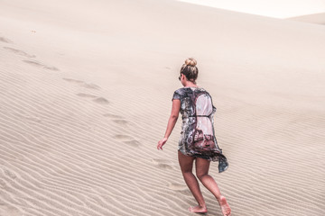 Girl Walking In Sand Dunes Gran Canaria