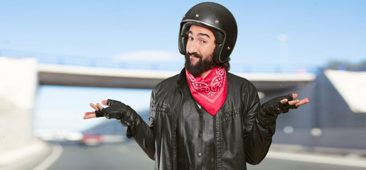 motorbike rider doubting confused