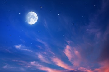 Obraz na płótnie Canvas Beautiful dark fluffy cloudy sky with sun rays . Crescent moon with beautiful sunset background . Generous Ramadan . New moon. Prayer time. 