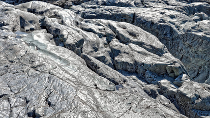beautiful texture of stone riverbed polished by mountain river flow, Vancouver Island Canada