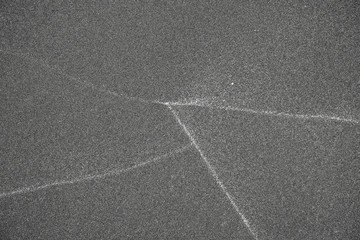 Tide lines on sand, beach at ebb.