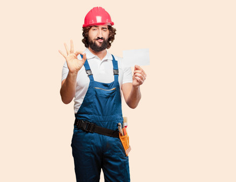 young man worker with a placard