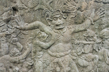 Fototapeta na wymiar Ancient stone carving in Ubud Bali Indonesia