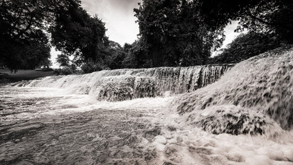 Waterfall in Thailand with rushing water in Black & White.