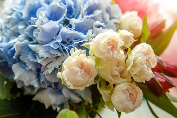 A bouquet of beige roses close-up 