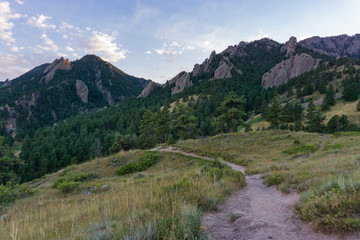 Fototapeta na wymiar Beautiful rocky mountain hiking trail at sunset
