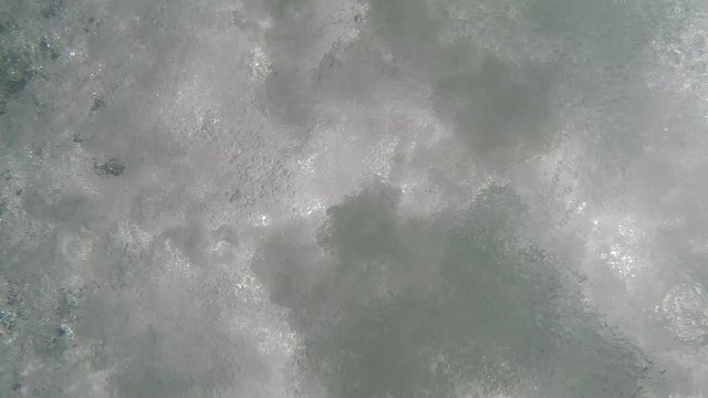 water bubbles from below shooting up