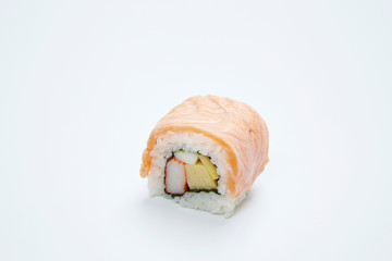 Philadelphia Maki Sushi made of Fresh Raw Salmon on white background.