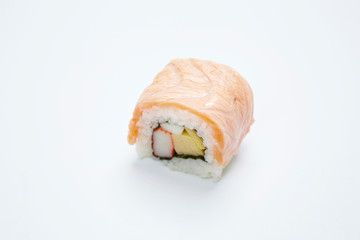 Philadelphia Maki Sushi made of Fresh Raw Salmon on white background.