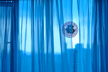 Window with curtains and Chinese paper cutting