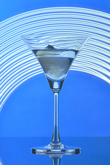 martini glass on backlight background