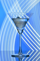 martini glass on backlight background