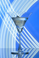 martini glass on backlight background