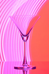 martini glass on backlight background