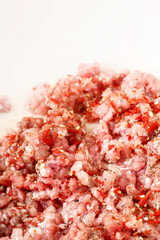 Minced meat with spices in a pan.