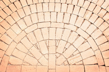 Fototapeta premium Brick pavement light brown floor background in semicircle seamless patterns texture top view