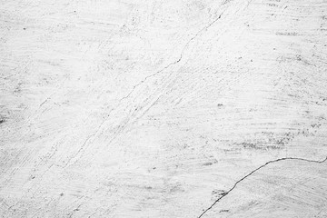 Texture of a concrete wall with cracks and scratches which can be used as a background