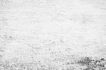 Texture of a concrete wall with cracks and scratches which can be used as a background