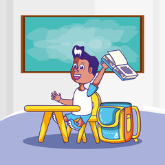 cute little student boy in the classroom