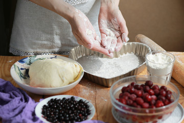 Making a pie from the dough. Cooking homemade flour products