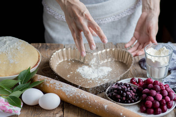 Making a pie from the dough. Cooking homemade flour products