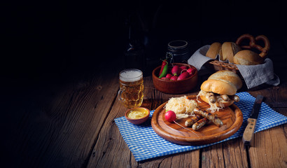 rustic Thuringian bratwurst with sauerkraut and roll