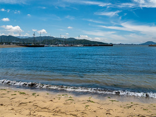 Sandy beach and yacht harbor