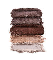Broken eyeshadows in trendy shades isolated on white background