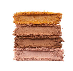 Broken eyeshadows in trendy shades isolated on white background