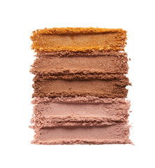 Broken eyeshadows in trendy shades isolated on white background