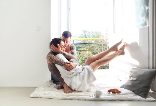 Young Tattooed Stylish Couple In Love