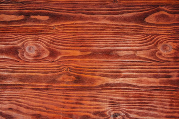 The structure of the mahogany surface as a background image. The creative concept of ecological nature. Background mahogany pattern - obrazy, fototapety, plakaty