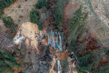 Autumn waterfall in the mountains