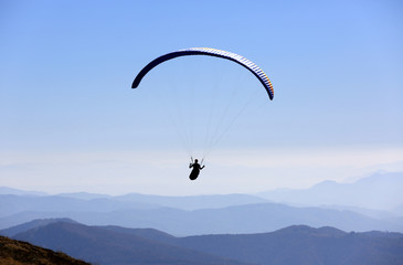 flying paraglider in air