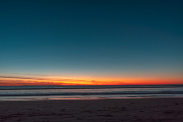 Blue sky after sunset on sea or ocean. Natural sky gradient example. Horizon line