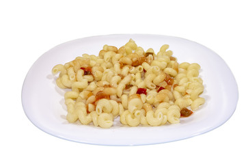 A white plate of macaroni with ketchup. Isolated on white background with clipping path. Close-up.
