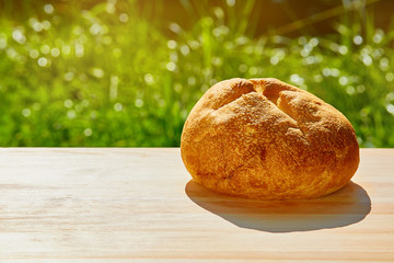 bread is on the table against the green