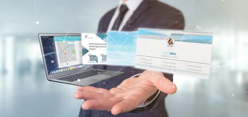 Businessman holding a Website application going out a laptop screen 3d rendering