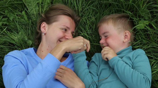 Mother and son fooling around. Happiness and love of mother and son