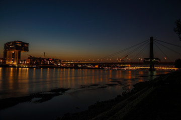 Rhine harbour at sunset with fantastic crane houses