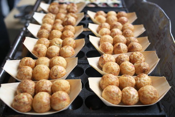 Tokyo,Japan-August 16, 2019: Takoyaki or octopus balls or octopus dumplings on cast iron