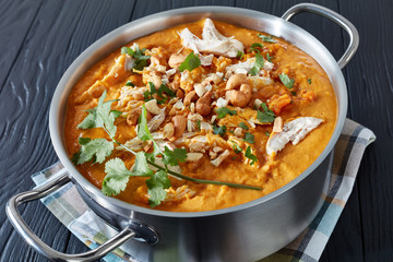 creamy red lentils soup with chicken meat