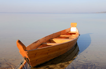wooden boat on lake