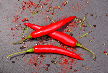 Fresh Chili pepper on dark background. View from above