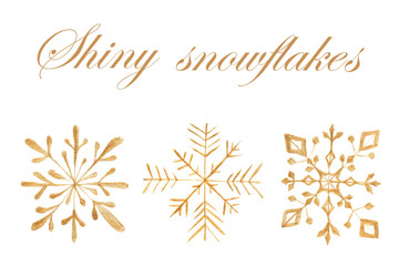Hand-painted illustration with collection of golden shiny snowflakes