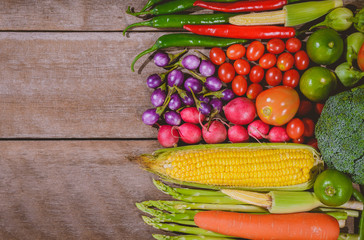 Backgroud of fresh food tasty and healthy varis vegetables are on the wooden table