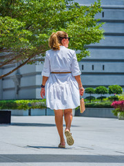 Woman walking in the marina bay area