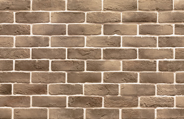 Horizontal photo of brown brick wall with light in the retro style
